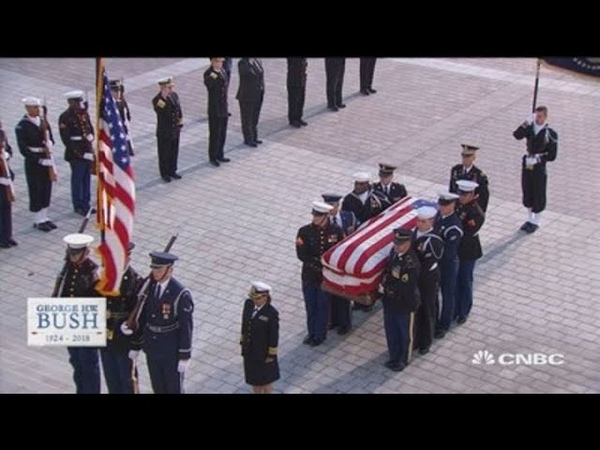 Former President George H. W. Bush escorted into
