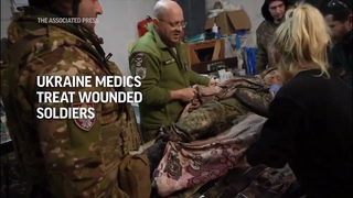 Ukraine medics treat wounded soldiers near Bakhmut