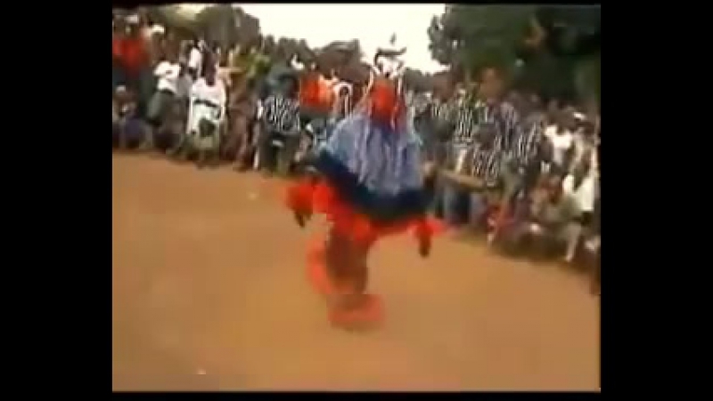 A dancing man on a stick amazing african tribal dance Zaouli
