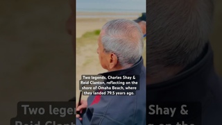 Two legends, Charles Shay & Reid Clanton, reflecting on the shore of Omaha Beach, where they landed.